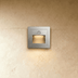Recessed wall-mounted LED step lights in four finishes: natural wood, black, light gray, and white, shown on interior stairca