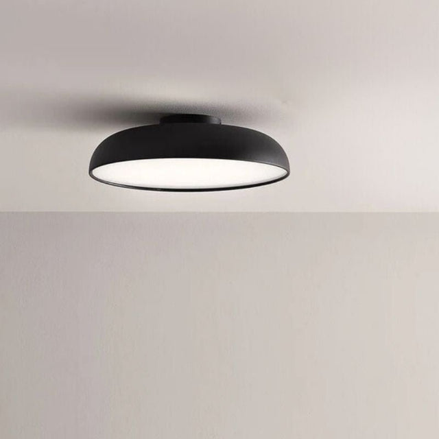 "Modern Noira ceiling light with a sleek black aluminum and steel finish, offering efficient light diffusion and a minimalist design for contemporary interiors."