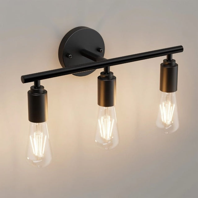 "Close-up of a 3-light industrial wall sconce with a minimalist design."