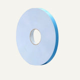 Side view of 9-inch (23 cm) adhesive tape roll, ideal for installing Nubain Wall Panels with a clean and seamless finish.