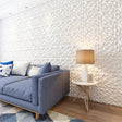 Modern living room with Nubain Wall Panel featuring 3D geometric PVC design, ideal for stylish interior wall decor and home improvement.