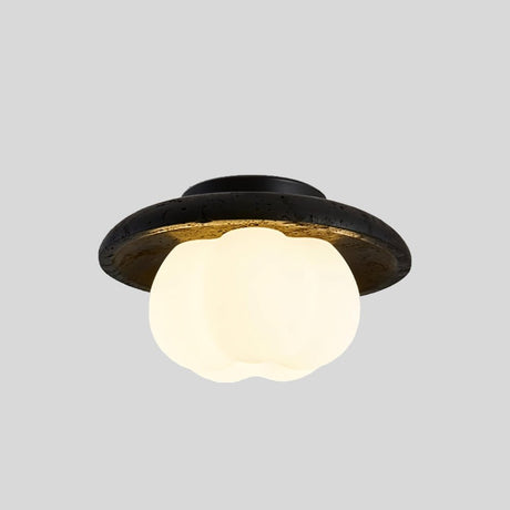 "A ceiling light with a black travertine frame and a cloud-shaped, white acrylic shade against a gray background."