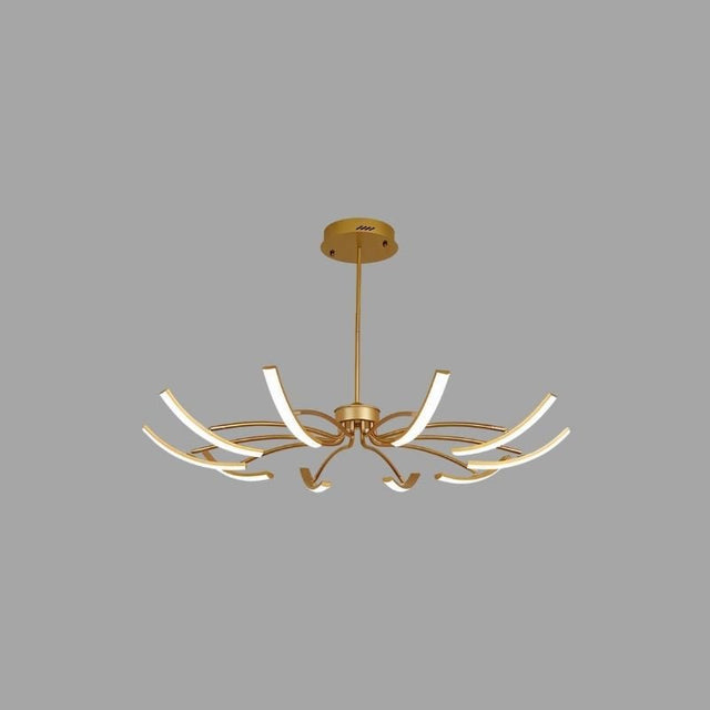 "A gold chandelier with twelve curved branches, each tipped with a white light, against a gray background."