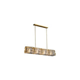 "A modern ceiling light with geometric glass shades and a gold frame."