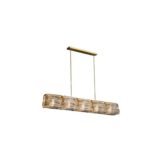 "A gold linear pendant light with textured glass shades."