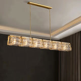 "Modern glass pendant light with gold frame and geometric shades."