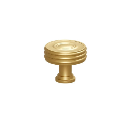 "Solid brass round knob with a grooved design, suitable for cabinets, wardrobes, or vanities."