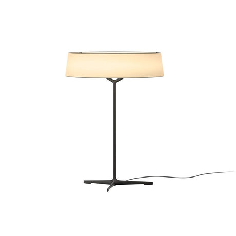 "A modern table lamp with a rectangular fabric shade and a sleek, dark-colored stand with a Y-shaped base."