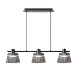 "Modern chandelier with three ribbed glass shades and a black iron frame, ideal for kitchen island lighting."