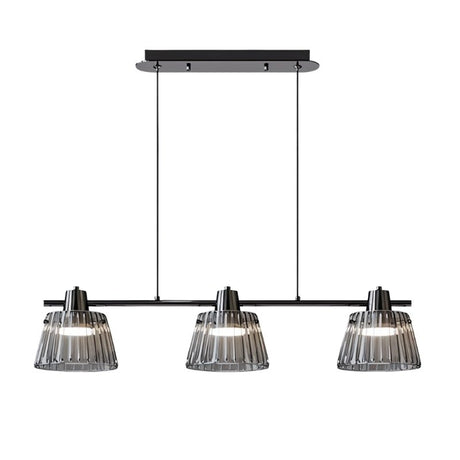 "Modern chandelier with three ribbed glass shades and a black iron frame, ideal for kitchen island lighting."