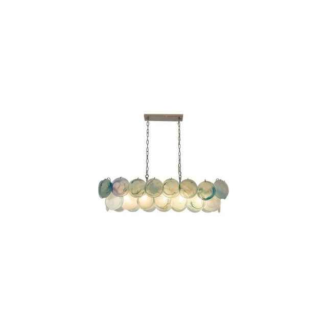 "A modern, rectangular chandelier with cascading light green and iridescent glass discs, suspended by chains."
