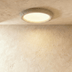 Oval ceiling light fixture with textured white shade, top view on white background, 19.6 inches wide by 2.3 inches tall.