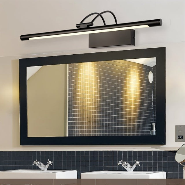 "A modern, black LED wall lamp illuminating a bathroom vanity with a double sink and mirror."