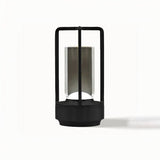 Orena Table Lamp - Sleek Rechargeable Indoor/Outdoor Light in matte black finish, featuring a minimalist open-frame design and LED core.