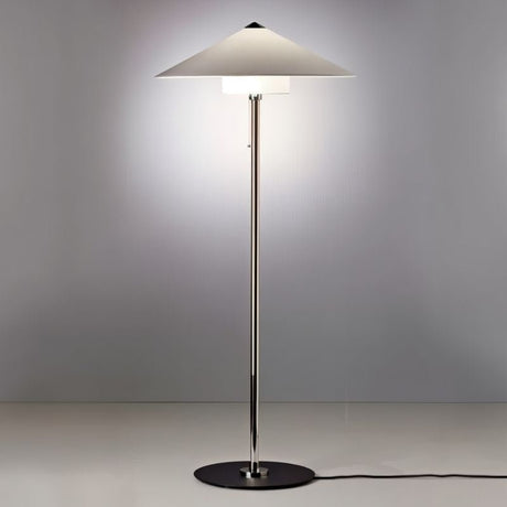 "Oriel floor lamp with a sleek metallic frame, wide conical fabric shade, made from aluminum, iron, and fabric, providing soft, diffused lighting in modern interiors."