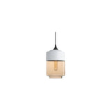 "A modern pendant light with a white cap and amber glass shade in a distinct shape, suspended by a thin black cord."