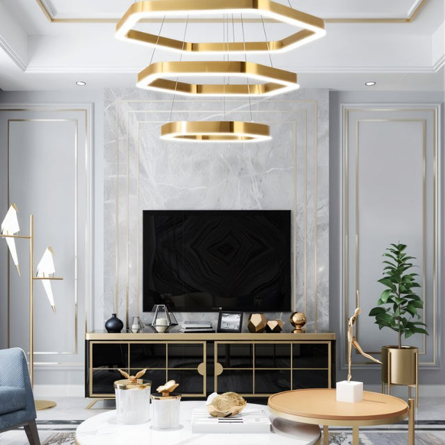 "A modern, geometric chandelier with interconnected gold frames hangs in a stylish living room with contemporary decor."