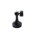 Black magnetic door stop with weighted base and metal catch plate on white background.