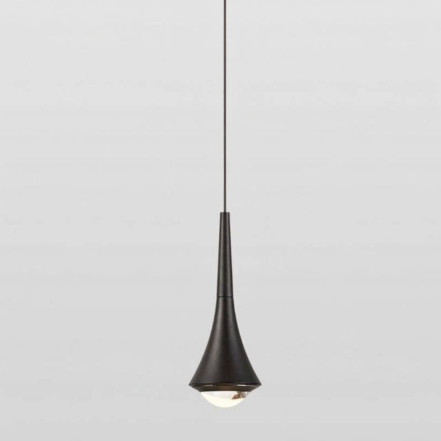 Osvet Pendant Light in black aluminum finish, featuring a minimalist design for modern indoor spaces.
