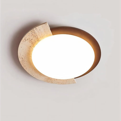 "Wabi-sabi flush mount light with a travertine stone accent and a white diffuser, mounted on a light-colored surface."