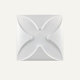 Pesni Wall Panel with smooth X-shaped 3D PVC design, suitable for modern wall panel installations in any room.