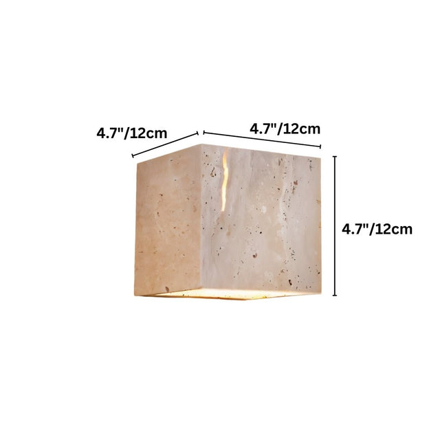 "Dimensions of a modern, cube-shaped wall lamp made of yellow travertine: 4.7 inches in height, width, and depth."