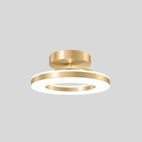 "Modern circular ceiling light with gold dual-ring design, illuminated, isolated on a gray background."