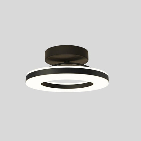 "Modern circular ceiling light with black dual-ring design, isolated on a white background."