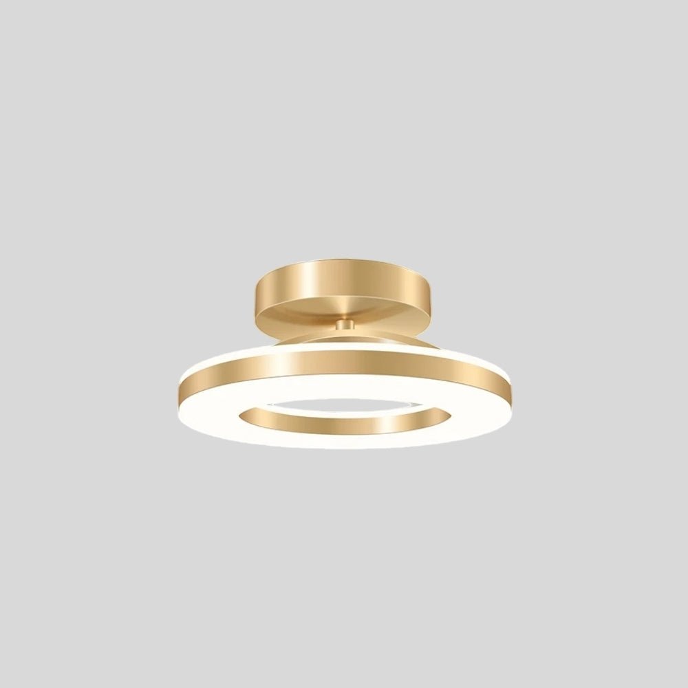 "Modern circular ceiling light with gold dual-ring design, isolated on a white background."