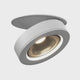 Simon Downlight - Industrial 360° Rotatable Lighting Fixture emitting warm light, designed for semi-recessed ceiling installation in modern interiors.