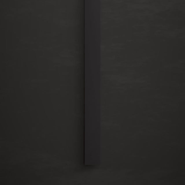 Side profile of Helios LED wall light in matte black finish, showcasing its slim, linear design for modern outdoor walls.