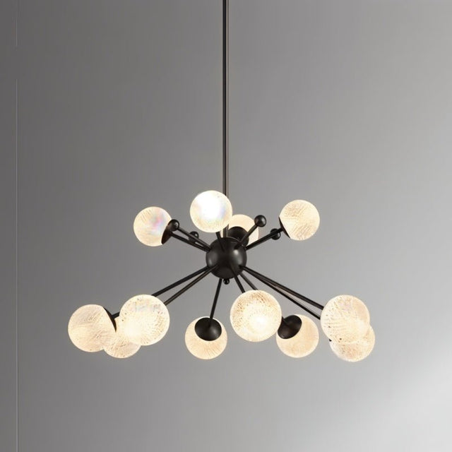 "Starburst chandelier with iron arms and textured acrylic diffusers, featuring ten lights against a gray background."