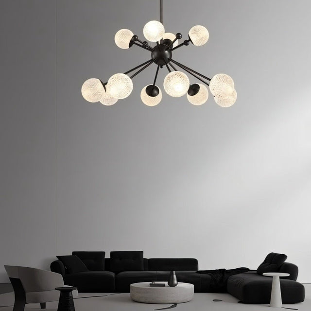 "Starburst chandelier with iron arms and textured acrylic diffusers, hanging above a living room with modern furniture."
