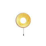 "Modern travertine wall lamp with a circular design and a convenient pull chain switch."