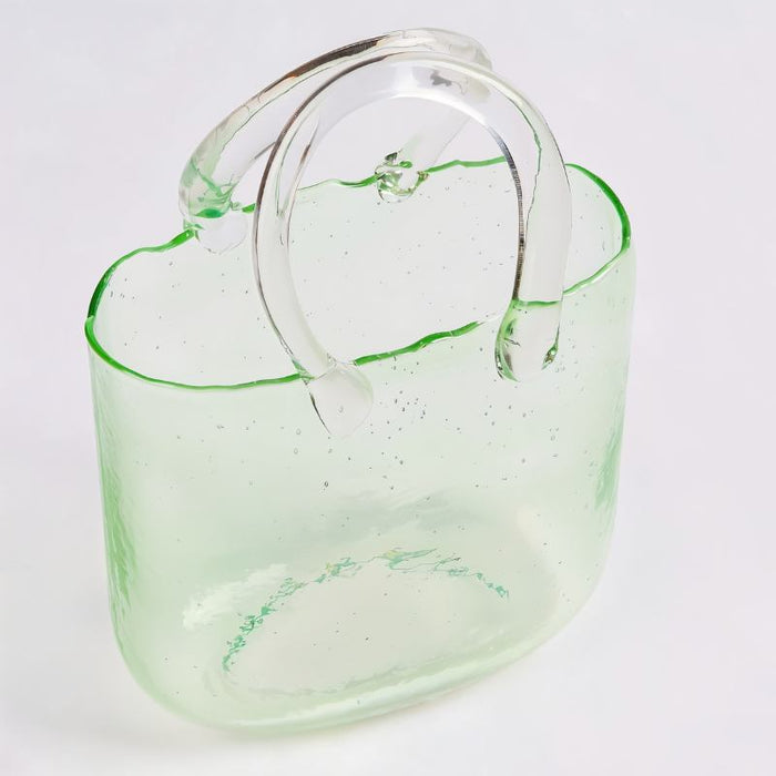 Contemporary Glass Purse Flower Vase: A sleek and modern purse vase made from clear glass, allowing your flowers to take center stage with their natural beauty.