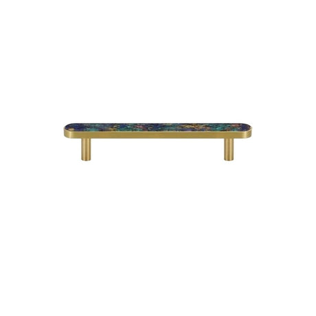 "A modern brass pull bar with a blue shell inlay, isolated on a white background."
