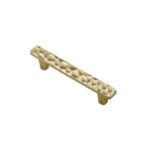 "Gold hammered texture pull bar handle with a sleek, modern design, isolated on a white background."