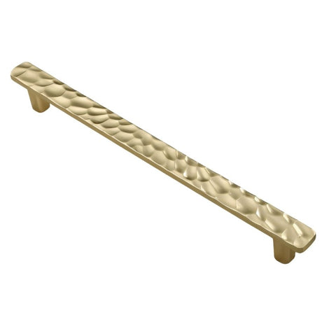 "Long gold hammered texture pull bar handle with a modern, artisanal design."