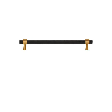 "A sleek black pull bar handle with gold accents on the mounts."