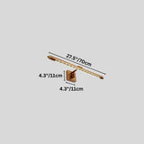 "A gold wall lamp with a Greek key pattern and adjustable arm, 70cm in length, with detailed dimension measurements in inches and centimeters on a grey background."