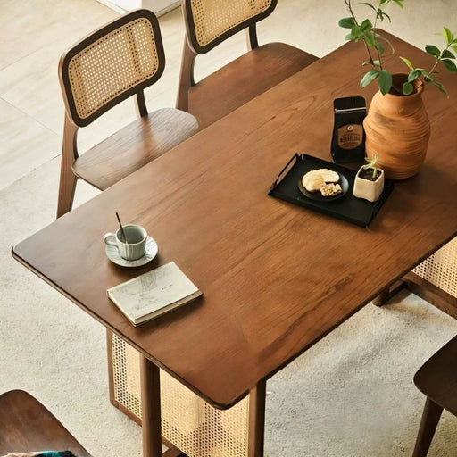 Boasting sleek lines and a minimalist aesthetic, the Rarus Dining Table embodies modern sophistication. Its clean silhouette and understated elegance make it a versatile centerpiece for any dining room or kitchen.