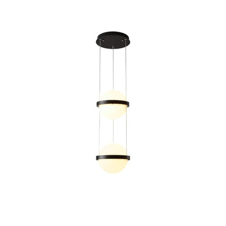 "Modern pendant light with two spherical frosted glass diffusers and iron bands, creating a sculptural, minimalist design."