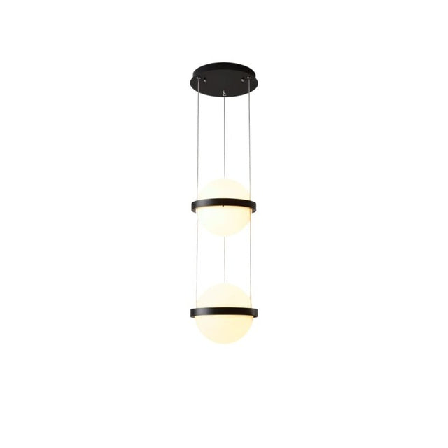 "Modern pendant light with two spherical frosted glass diffusers and iron bands, creating a sculptural, minimalist design."