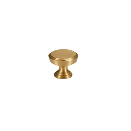 "A solid brass cabinet knob with a cylindrical design and machined detailing, on a white background."