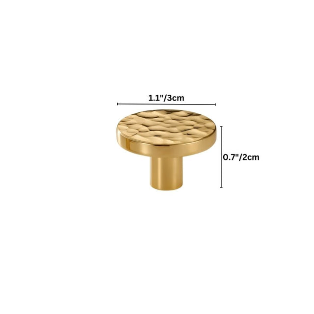 "Dimensions of a hammered brass round knob, ideal for cabinetry and drawers, showcasing its textured design."