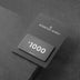Black gift card showing "$1000" value displayed on dark textured background.