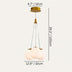 Three frosted glass globe pendant lights suspended from brass fittings against a neutral background.