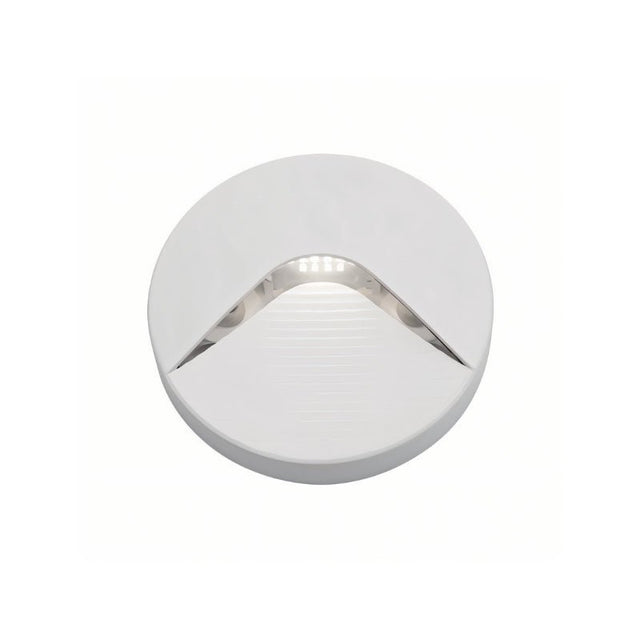 "A sleek, round step light with a minimalist design, featuring a durable plastic body and clear acrylic diffuser, providing a soft, focused downward glow."