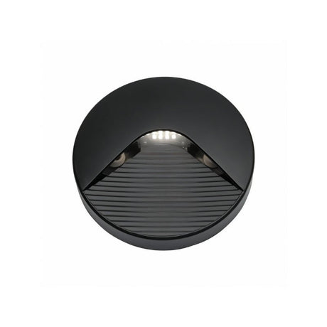 "A sleek, round step light with a minimalist design, featuring a durable plastic body and clear acrylic diffuser, providing a soft, focused downward glow for indoor and outdoor spaces."