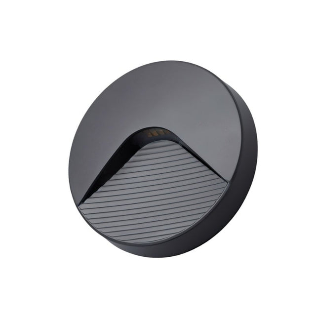 "A sleek, round, minimalist lighting fixture with a clear acrylic diffuser, designed for both indoor and outdoor spaces, providing a soft, focused downward glow."